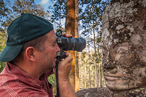 Photo of John, taking photos in Cambodia